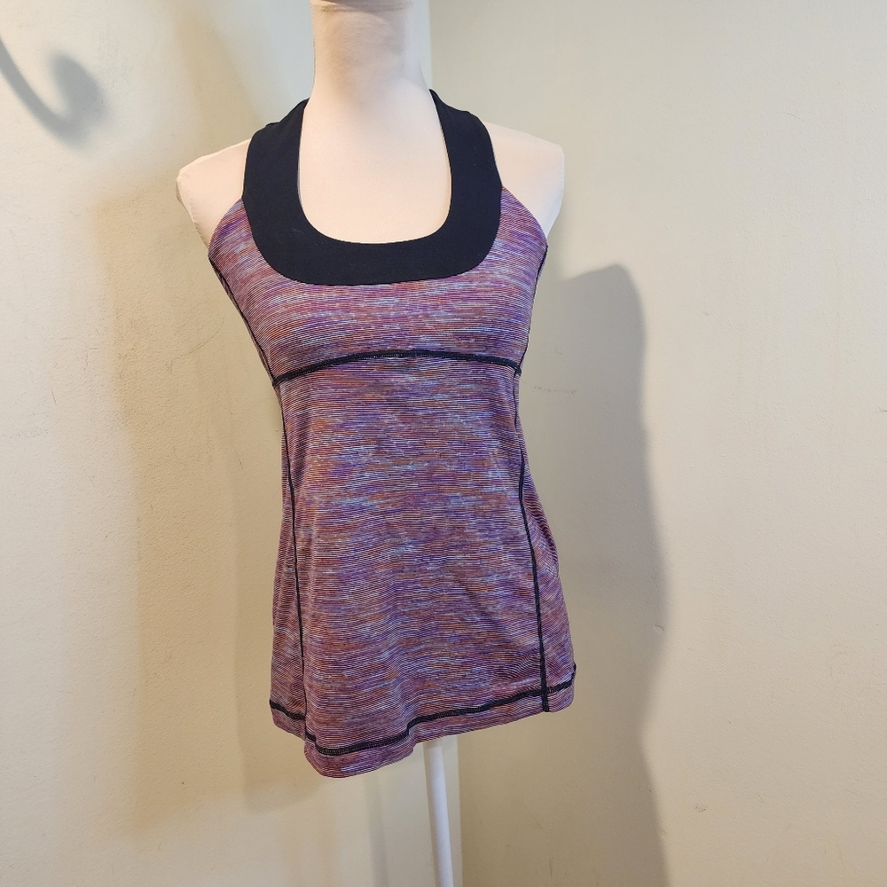 Lululemon Scoop Neck Tank features a multi-colored striped pattern  Fits M